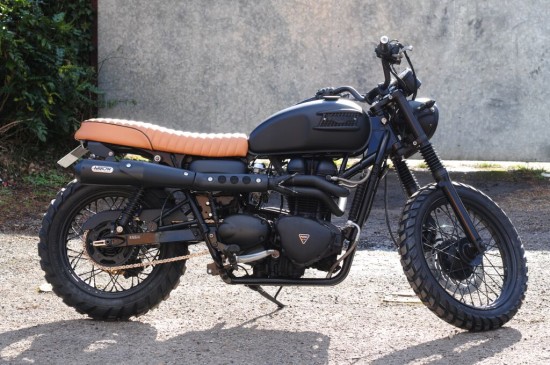 A motorcycle parked on the side of a road.